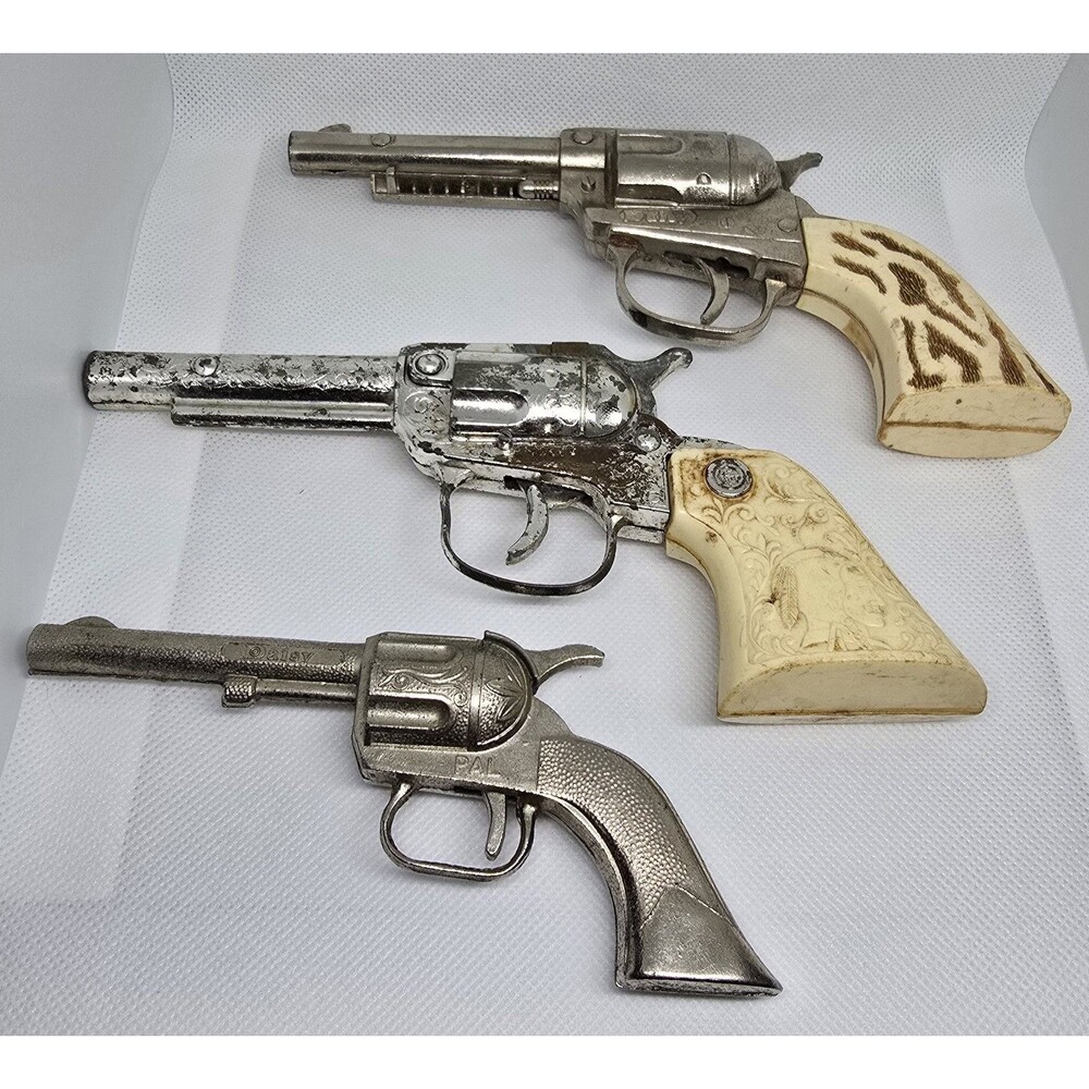 Vintage 2 Daisy Chrome Plated Cap Toys - Die Cast Metal Repeater Toy